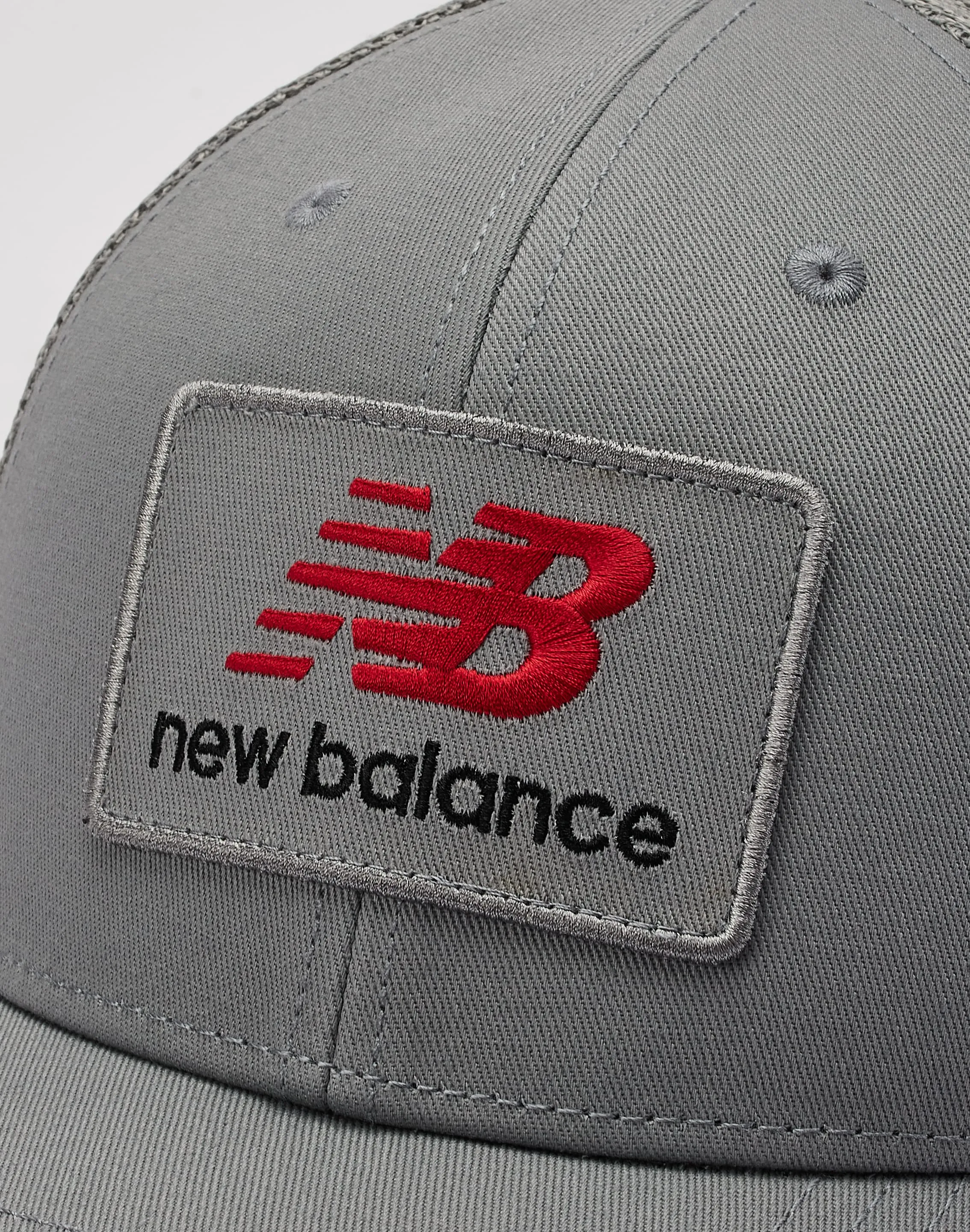 New Balance Stacked Patch Logo Trucker Hat